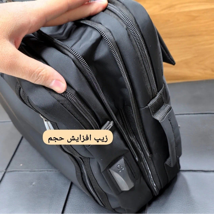 کیف اداری لپتاپی 3 کاره بنلتون جنس دیبا ضخیم رنگ مشکی